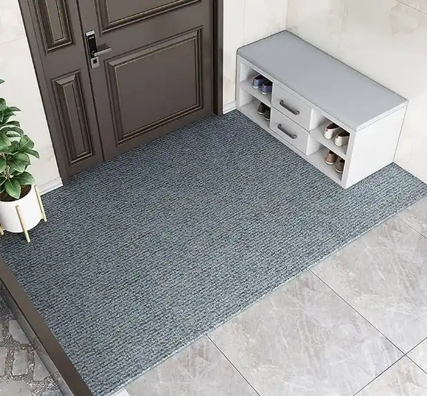 sound-deadening rug against the door
